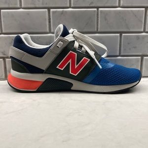New Balance 247 blue, orange, grey, and navy. US size 5